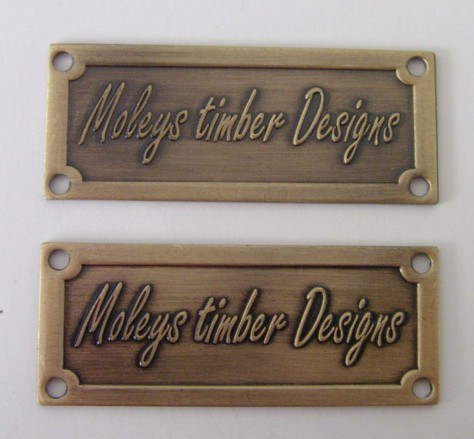 brass furniture badge with four hole