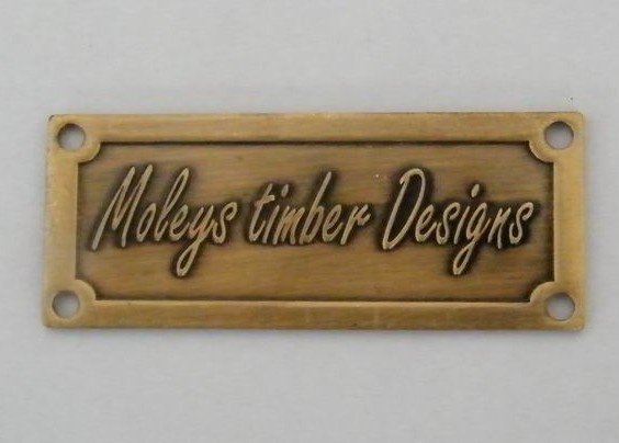 brass furniture badge with four hole