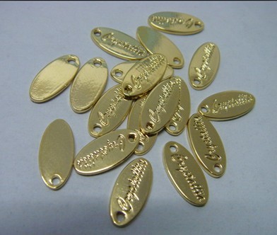 gold and silver plated badge